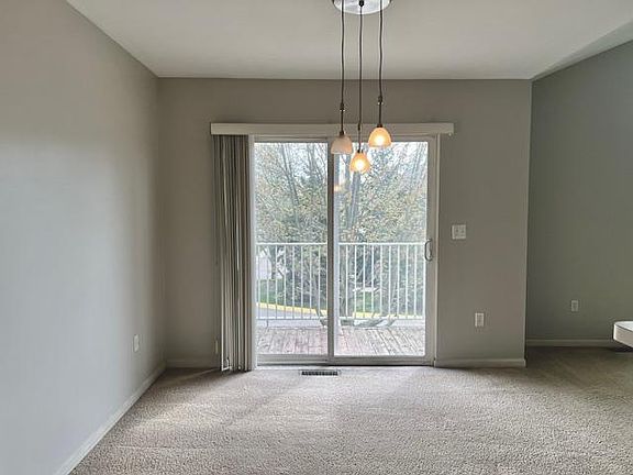 dining area leading to front deck