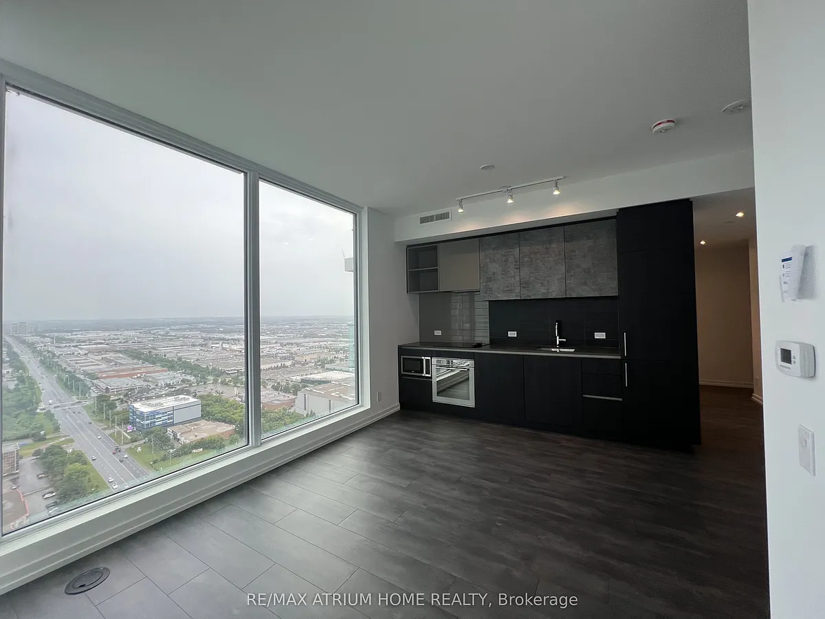 Building Photo - 7890 Jane St #3906