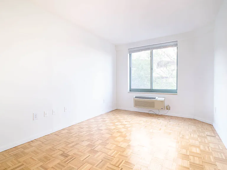 Bedroom with Parquet Flooring