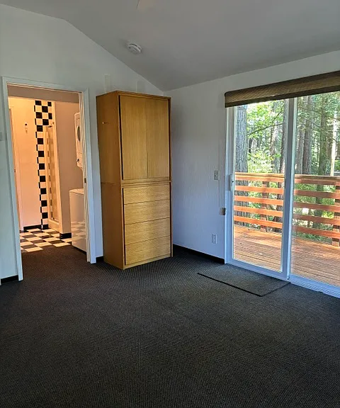 Bedroom with sliding door to deck