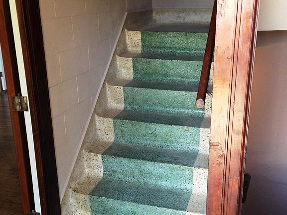 Stair to second floor and apartment