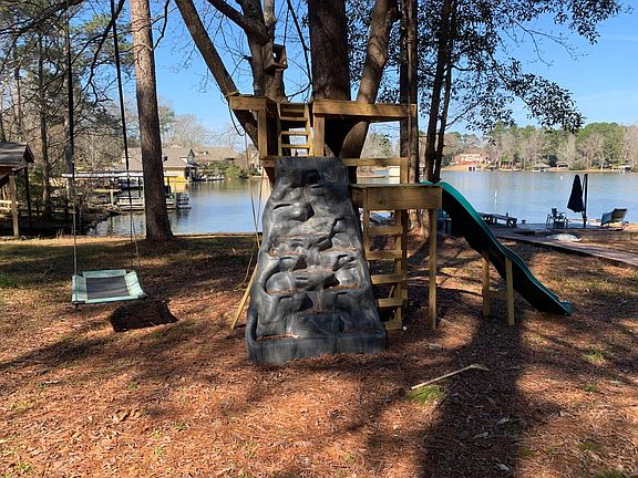 back yard tree house by the lake