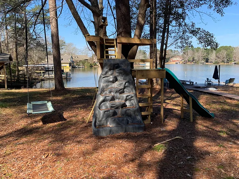 back yard tree house by the lake