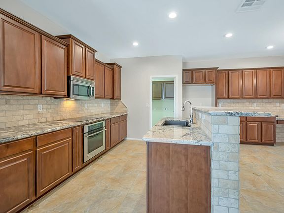 5th image of 11419 E Cliffrose Ln