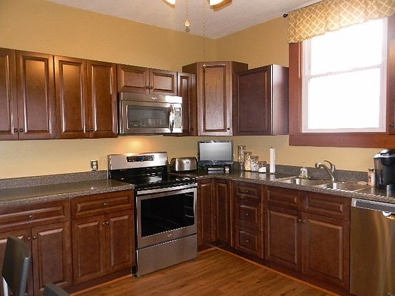 Remodeled kitchen: New floors, counter tops, cabinets and appliances.