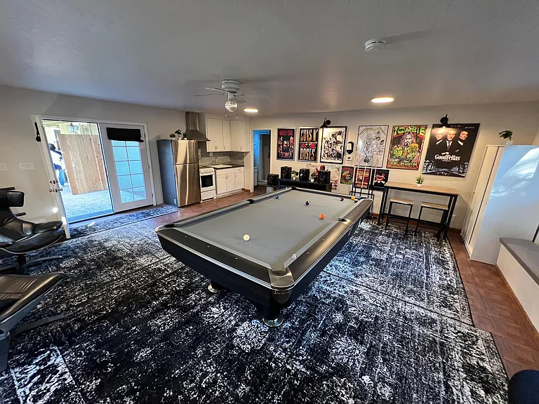 Giant 4th bedroom (Casita/Studio) separate from main house with full kitchenette and full bath.