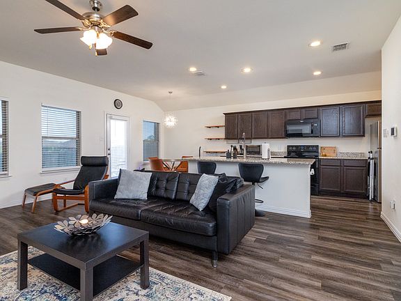 +65 inch TV
+Seating 
+Open concept kitchen/living room 
+LVP
