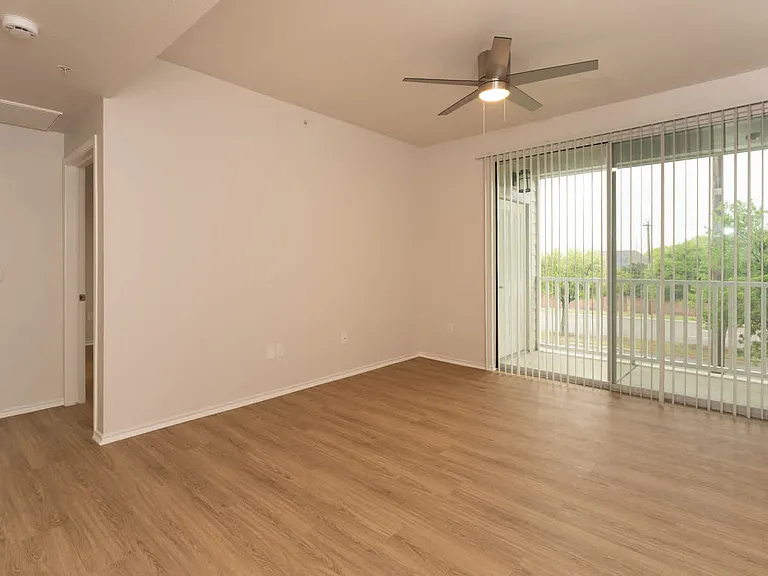 living room with balcony hard surface flooring