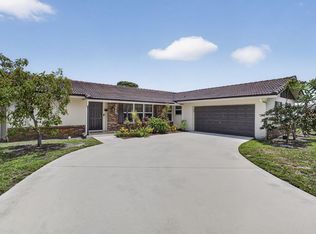 9860 Honeysuckle Avenue, Palm Beach Gardens, FL 33410