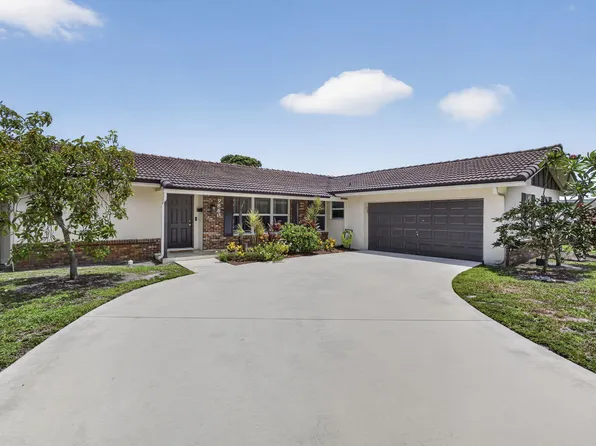 9860 Honeysuckle Avenue, Palm Beach Gardens, FL 33410