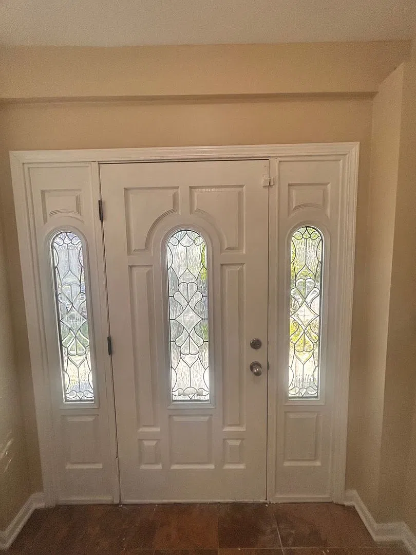 3-Bedroom Corner Home with Hardwood Floors, Sunroom, and Fenced Backyard — Photo 4