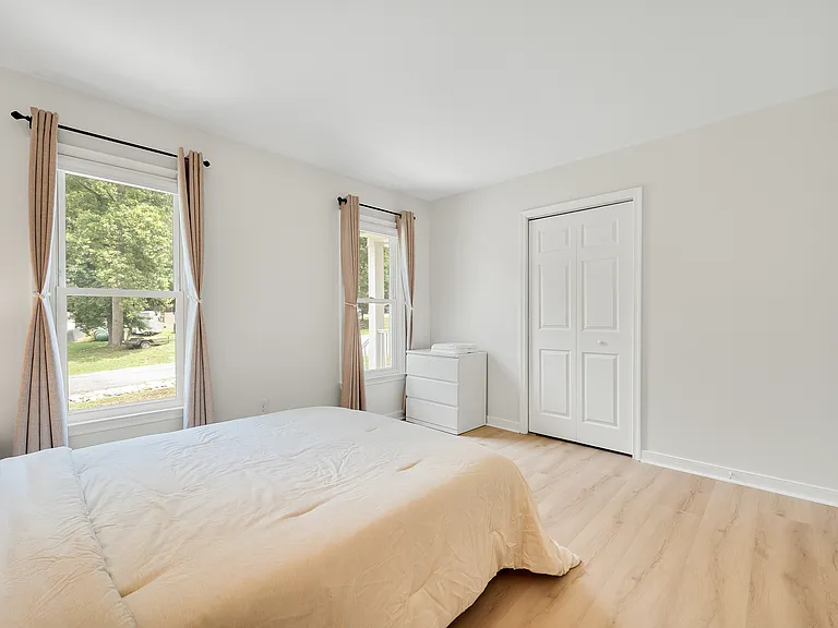 Bedroom 2, on 1st floor. Queen bed, with 100% organic cotton, breathable, OEKO-TEX_ certified sheets. Blackout curtains.