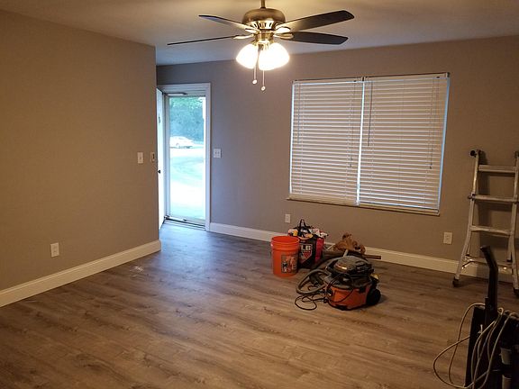 Living room with new remote controlled ceiling fan & light