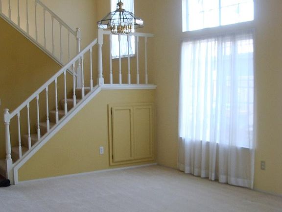 Dining Room with storage under stairwell