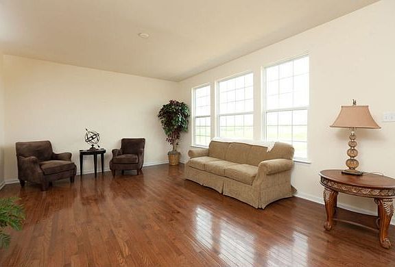 The Ashton Family Room with hardwood floors