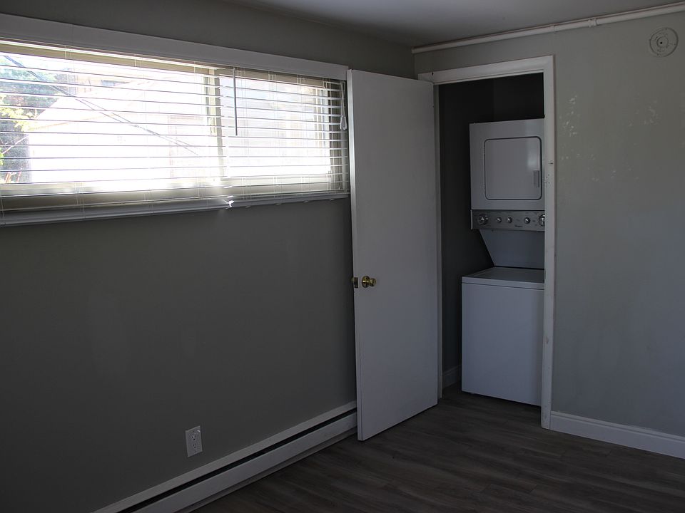 Stackable washer/dryer in closet.