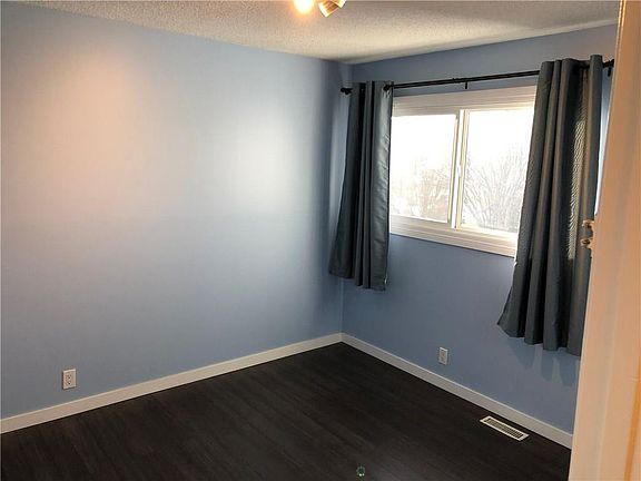 5th image of 200 Shawnessy Dr SW Unit 103