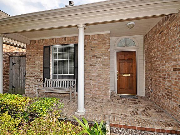 View of the nice covered porch.  Say hi to your neighbors.