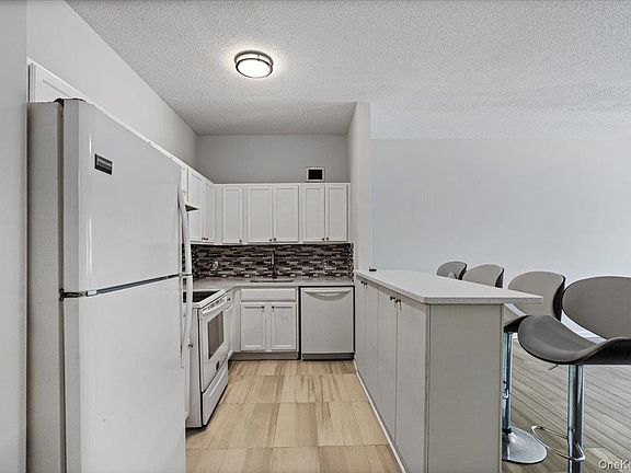 3rd image of 221 Beach 80th Street #1G