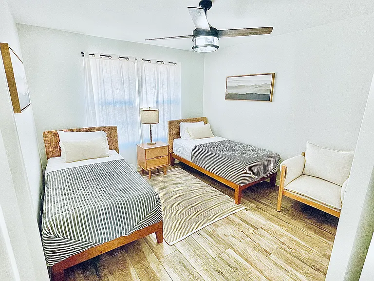 Twin size beds, siting area