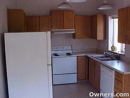 Bright & sunny kitchen opens to dining area