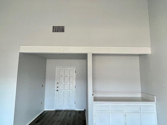 Entrance and wet bar.