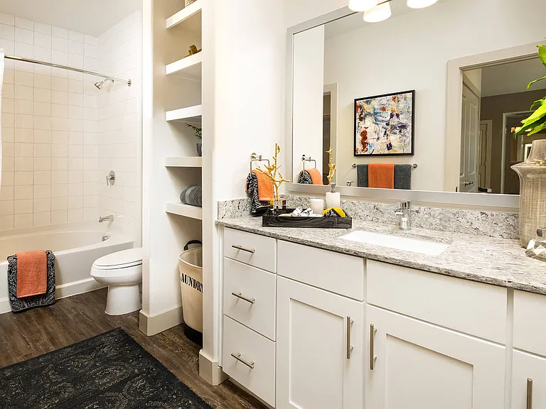Spa-inspired bathrooms featuring large soaking tubs offer the perfect retreat for relaxation and comfort.