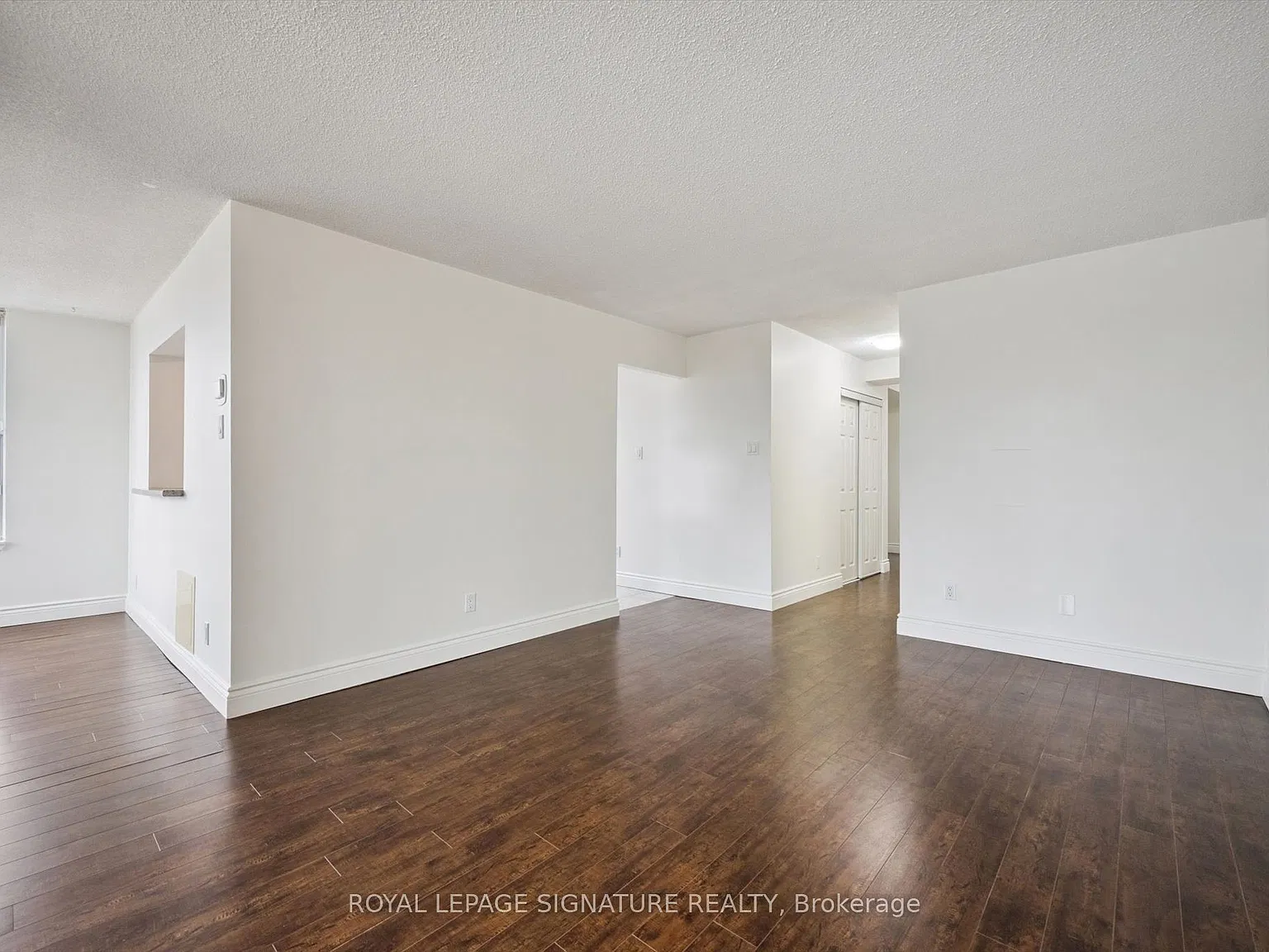 Queen's Place Condominiums — Photo 4