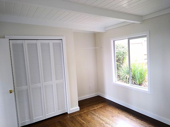 Area to right of closet in main bedroom can be used as additional closet and/or storage area. Neutral colors will set off your bedroom furnishings.