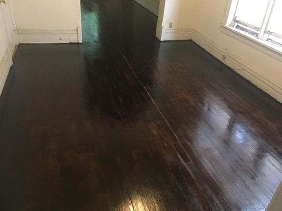 Dining room floor - Dark walnut stain 
Without furniture