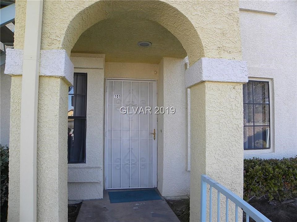 Covered entry with security door.