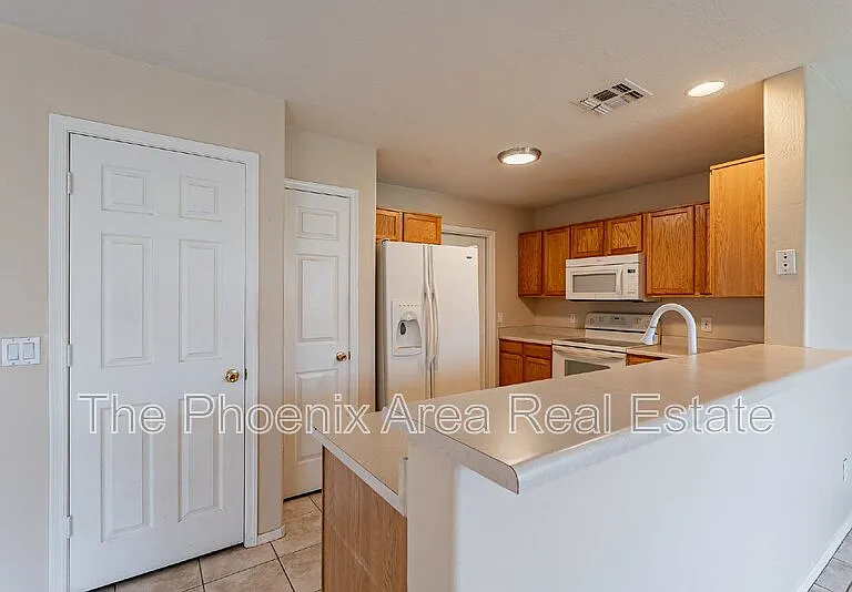 11928 W Columbine Dr — Photo 11
