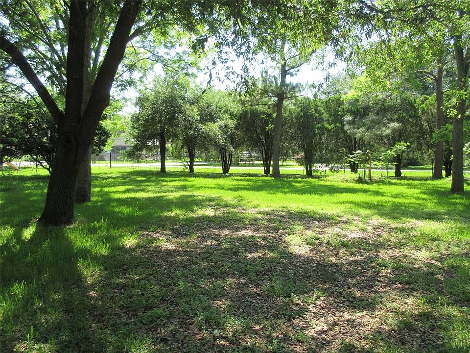 Build your dream home on the 1+ acre treed lot in Sugar Land.