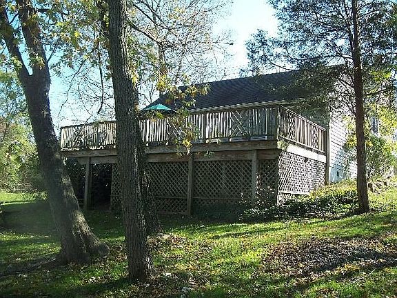 Rear deck overlooking parklike yard