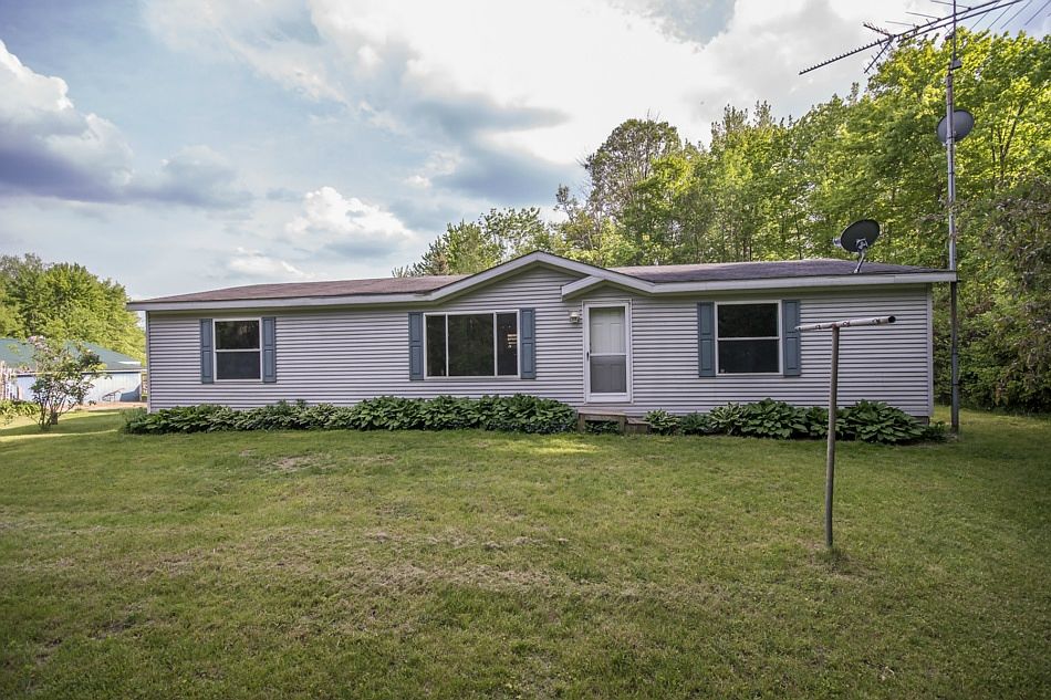 ASTONISHING ON ALAMANDO!A lot of over seven and a half acres offers many out buildings, three ponds, wooded trails and a very large garden to promote the private and self-reliant life style so many are looking for. With three spacious bedrooms, two full bathrooms and 1798 square feet to meet the needs of a growing family. This home is ready to move right into, and settle down. An impressive four car garage will insure that you will have ample storage and an area to park your vehicles. A large work shop adds to the value of this garage and provides a place to work on projects in a great environment. Call today for your own private tour!