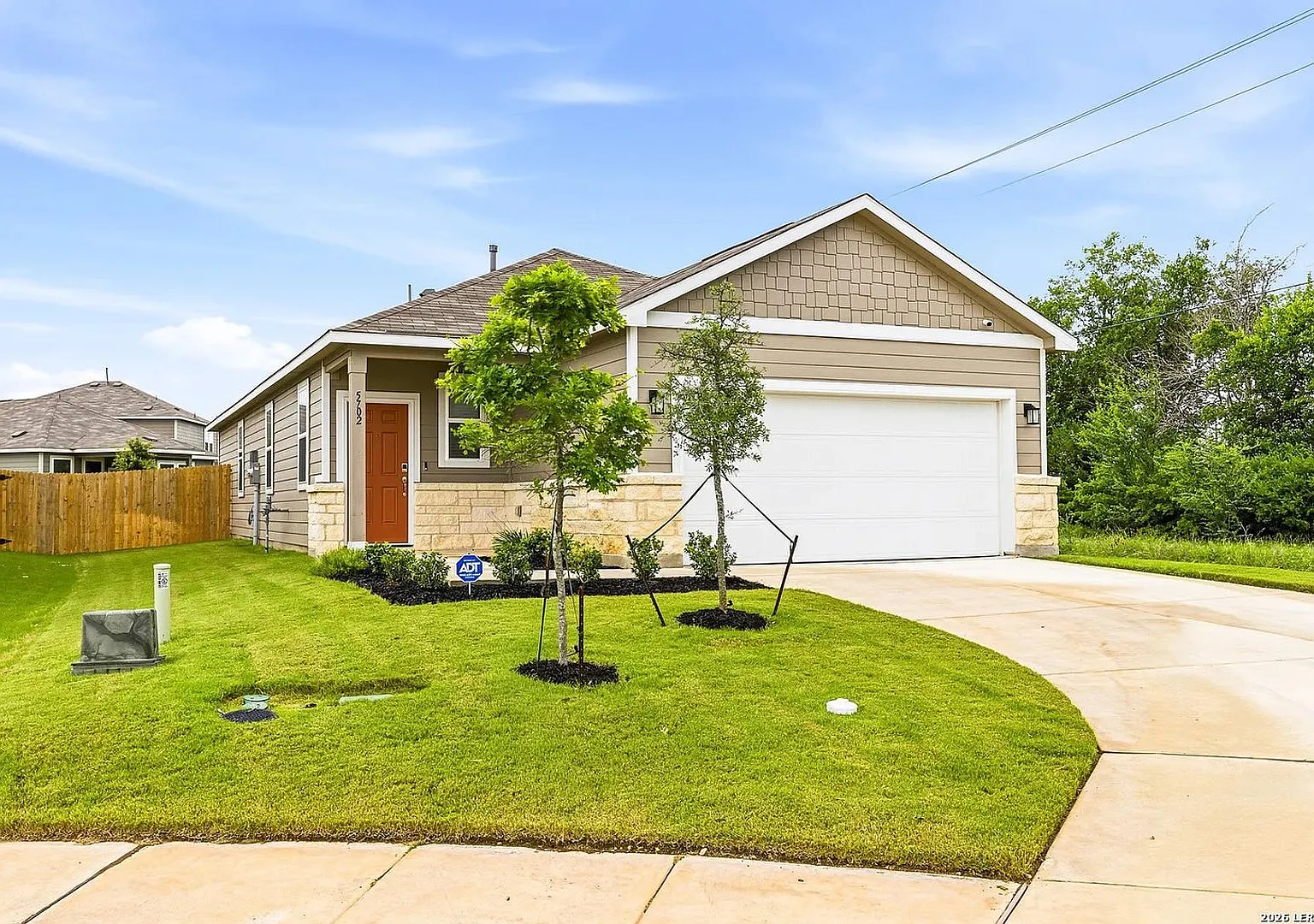 Modern 3BR Home with Upgrades & Private Greenbelt Setting — Photo 2