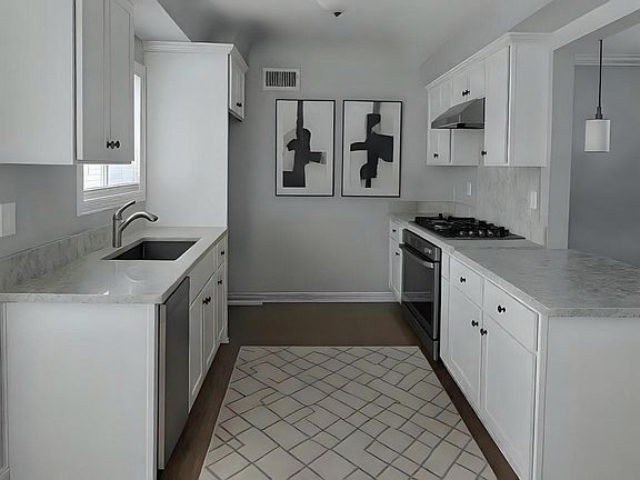 2nd image of 10239 8th Ave #3