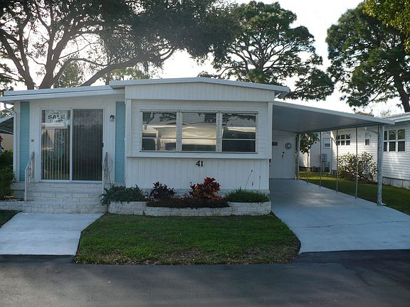 covered carport with storage