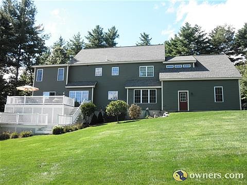 Back of house w/ 2 tiered deck
