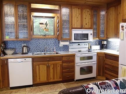 Updated kitchen with glass tile