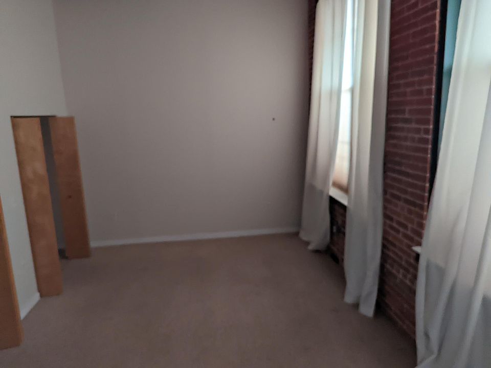 Smaller bedroom, still HUGE and double closet goes from wall to wall.