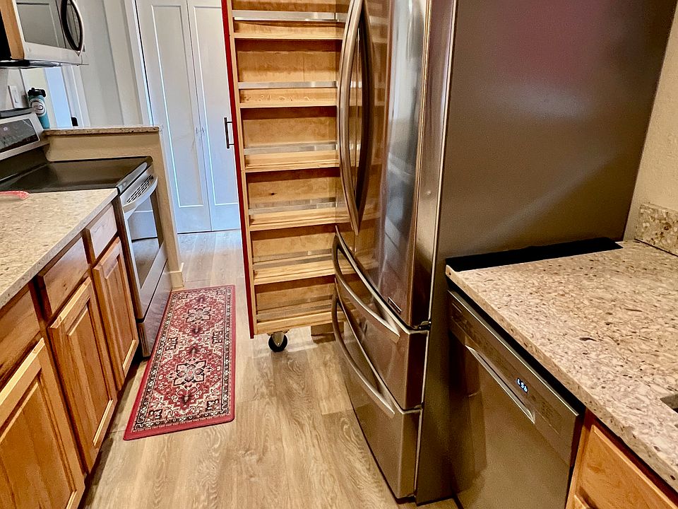East view of kitchen with roll out pantry. All new appliances in 2021