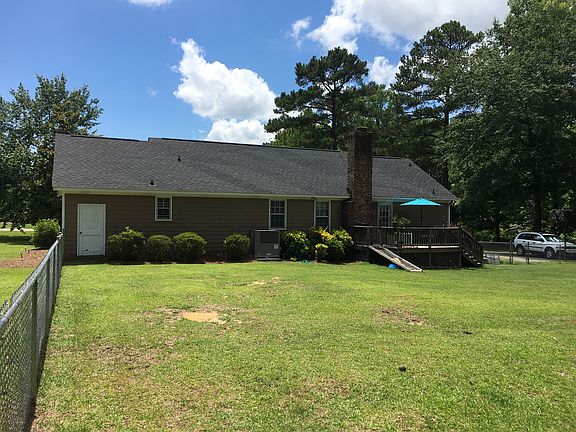 Rear of home with deck