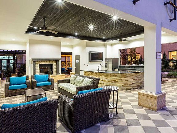 Outdoor Kitchen, Fireplace, & Television