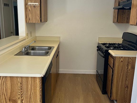 Very clean and with brand new stove and hood and dishwasher that is like new.