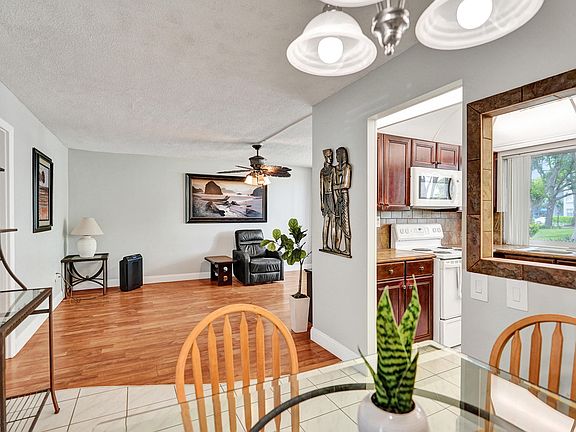 5th image of 9080 Lime Bay Boulevard #104