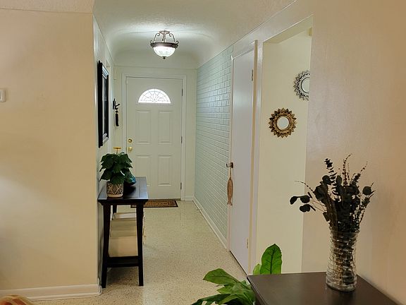 Welcome home! Front hallway has a coat closet and room for a 'drop' station of keys, handbags, shoes and glasses.