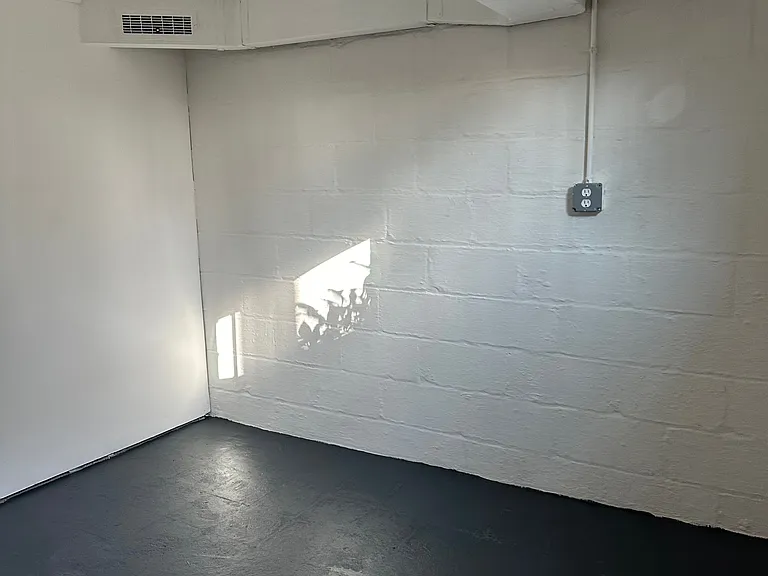 Storage room, in basement area, perfect for Costco runs. 
Basement is unfinished, lots of storage space and with laundry center. 
Walk out to garage.