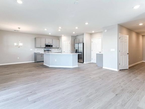 Your new home features a bright and welcoming open-concept living area - Seabrooke ll home plan by H