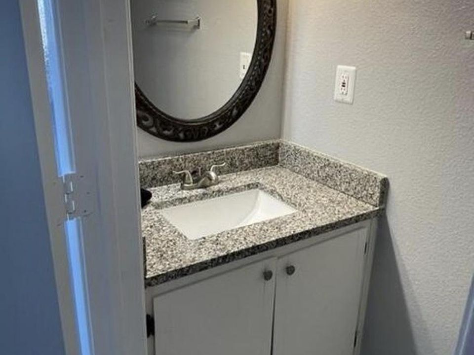 Second half bathroom off dining area on main floor.